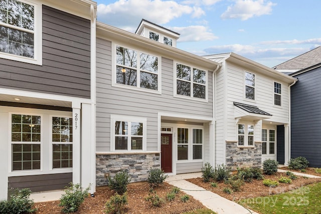 view of front facade featuring stone siding