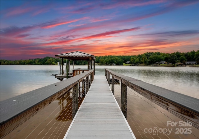 dock area featuring a water view