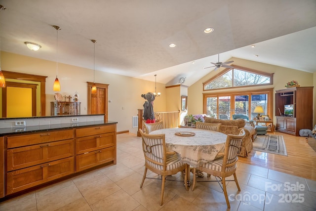 dining room featuring recessed lighting, visible vents, a ceiling fan, light tile patterned flooring, and high vaulted ceiling