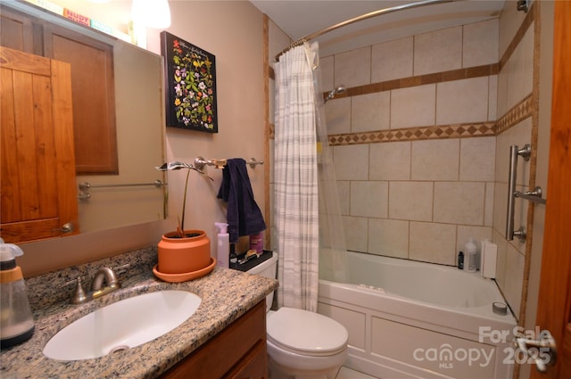 bathroom featuring vanity, toilet, and shower / tub combo with curtain