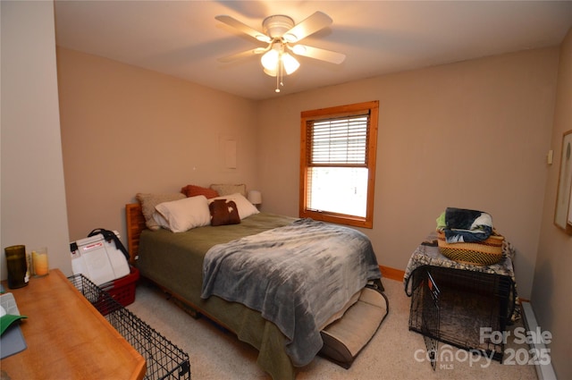 carpeted bedroom featuring a ceiling fan