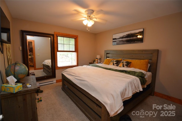 bedroom featuring carpet, baseboards, baseboard heating, and a ceiling fan