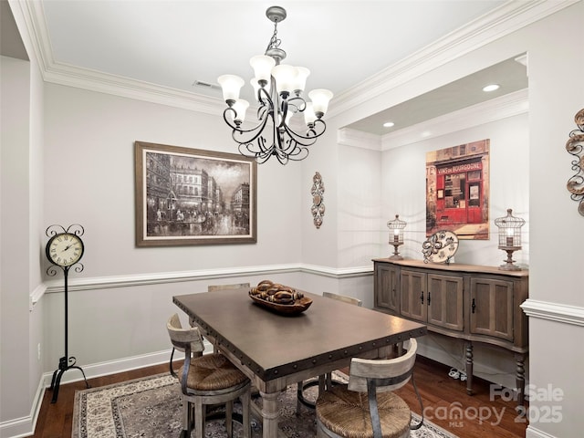 dining area with ornamental molding, dark wood-style flooring, and baseboards