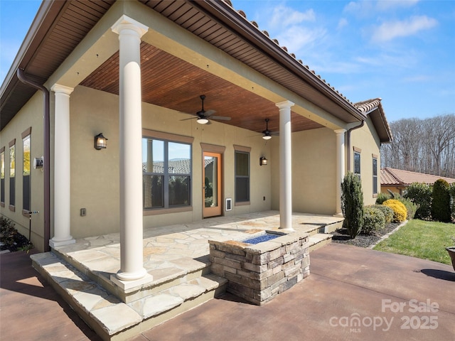 view of patio / terrace with a ceiling fan