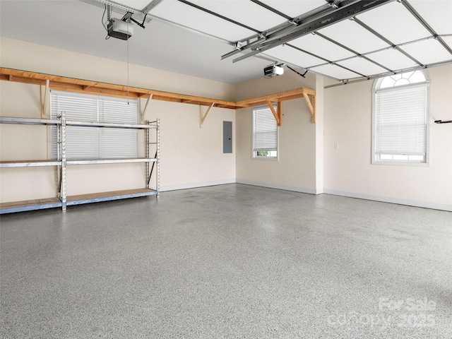 garage featuring electric panel, baseboards, and a garage door opener