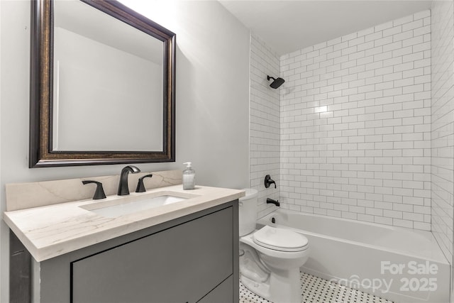 full bathroom featuring tile patterned flooring, shower / bath combination, vanity, and toilet