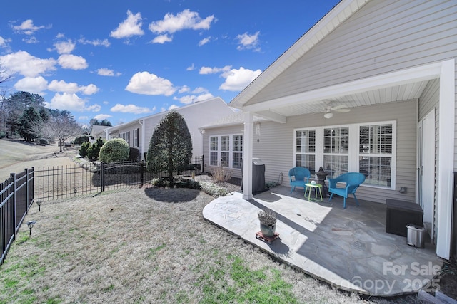 view of patio / terrace featuring ceiling fan and a fenced backyard