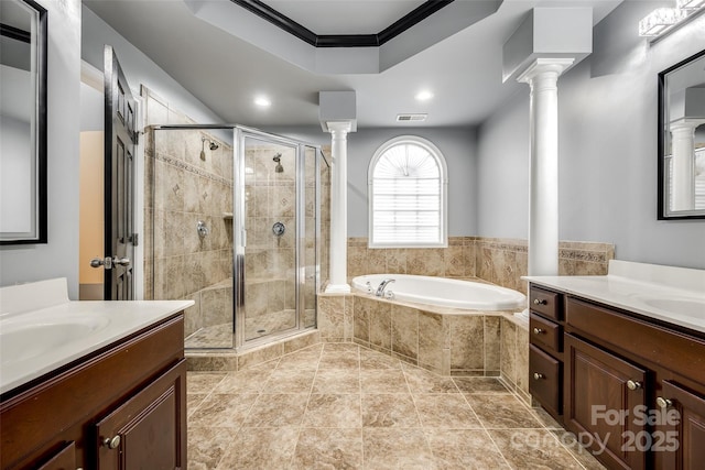 bathroom featuring two vanities, visible vents, decorative columns, and a shower stall