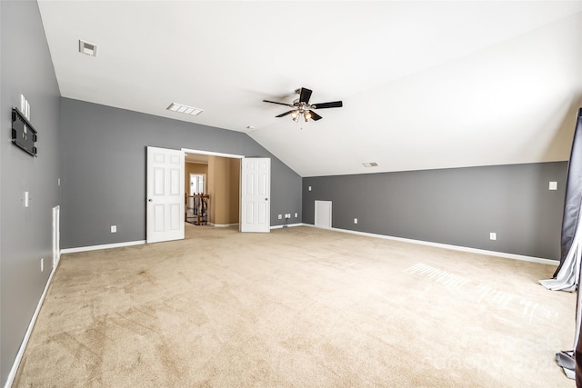 bonus room featuring light carpet, visible vents, and baseboards