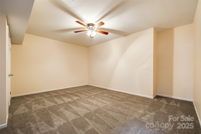 empty room featuring carpet floors, baseboards, and a ceiling fan