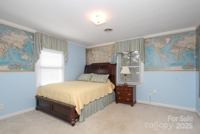 carpeted bedroom featuring baseboards, visible vents, and ornamental molding