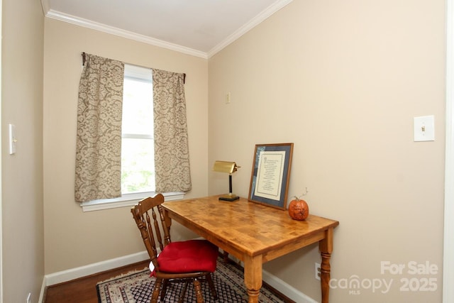 office space featuring wood finished floors, baseboards, and ornamental molding