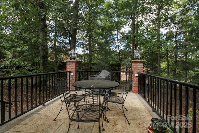 view of patio with outdoor dining area