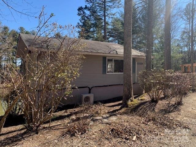 view of property exterior with ac unit