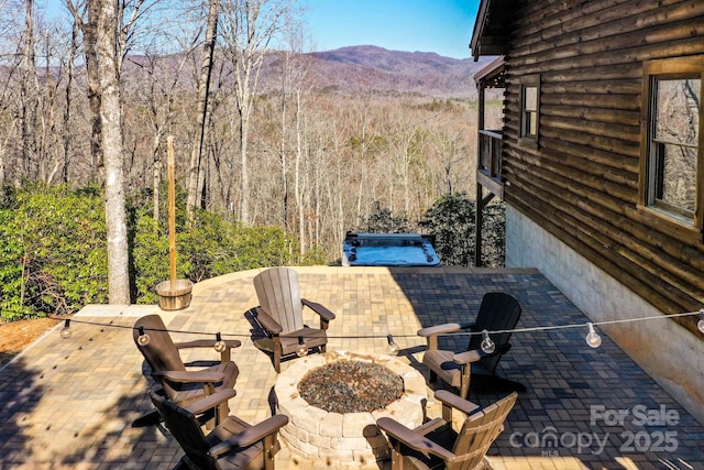 view of patio / terrace with a mountain view