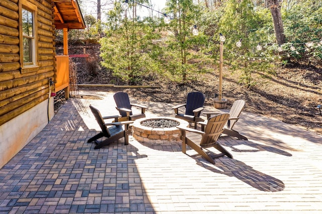 view of patio featuring a fire pit
