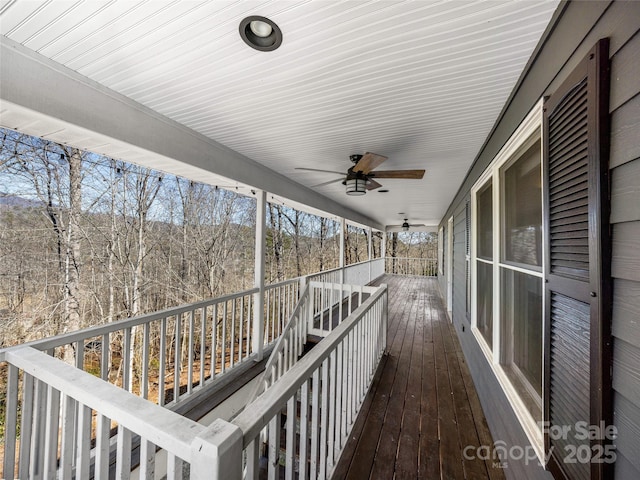 wooden terrace with ceiling fan