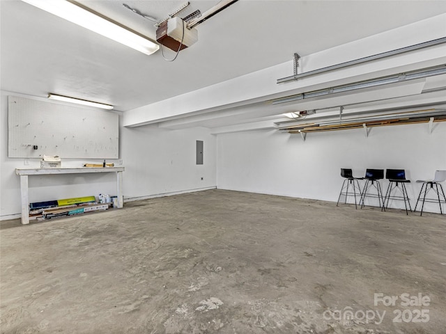 garage featuring a garage door opener and electric panel