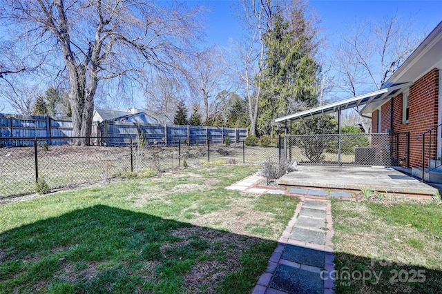 view of yard featuring a fenced backyard and a patio