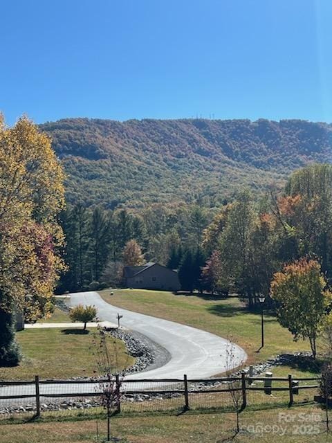 mountain view featuring a view of trees