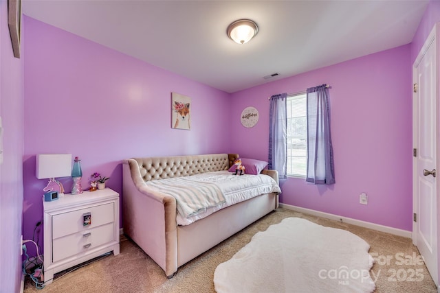 bedroom featuring carpet floors, baseboards, and visible vents