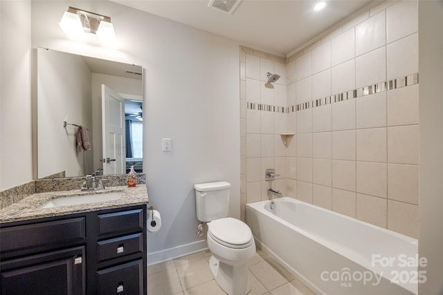 bathroom featuring tile patterned flooring, toilet, vanity, visible vents, and shower / bathing tub combination