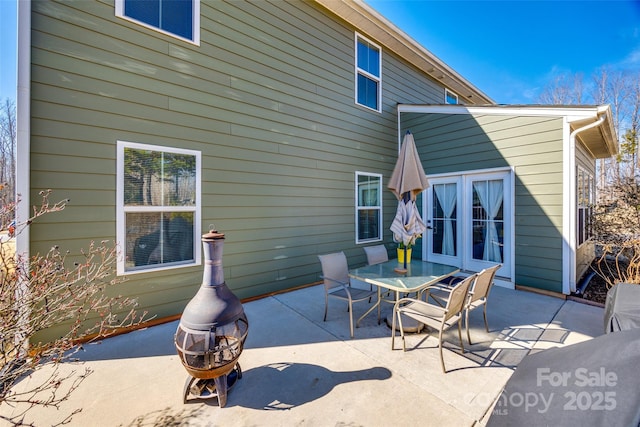 view of patio / terrace featuring a fire pit and outdoor dining area