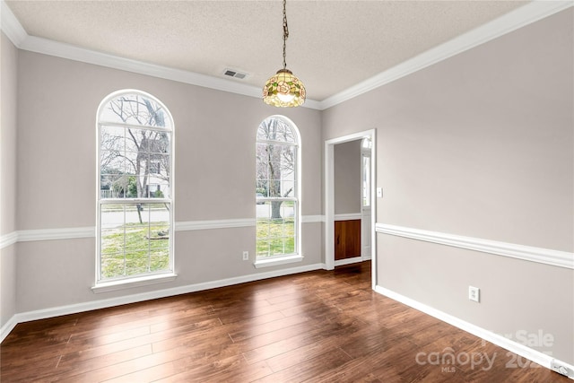 9138 Babbitt Way, Charlotte, NC 28216 - unfurnished dining area featuring a textured ceiling, wood-type flooring, and crown molding