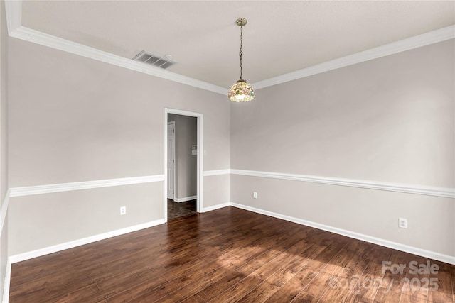 9138 Babbitt Way, Charlotte, NC 28216 - empty room with dark wood finished floors and ornamental molding