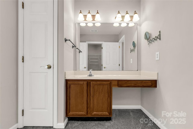 9138 Babbitt Way, Charlotte, NC 28216 - bathroom featuring a closet and vanity