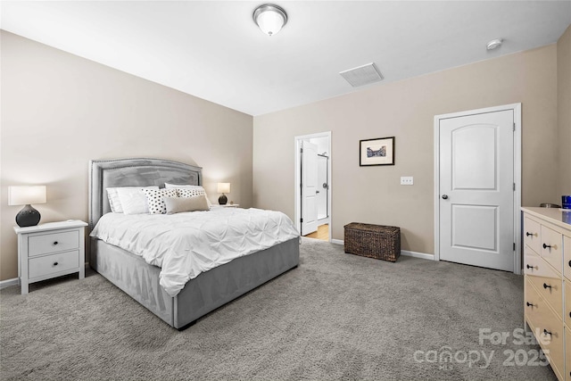 bedroom featuring visible vents, carpet, and baseboards