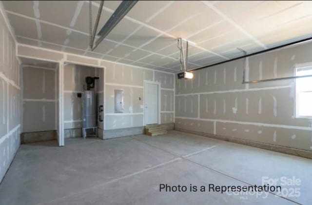 garage featuring secured water heater, electric panel, and a garage door opener