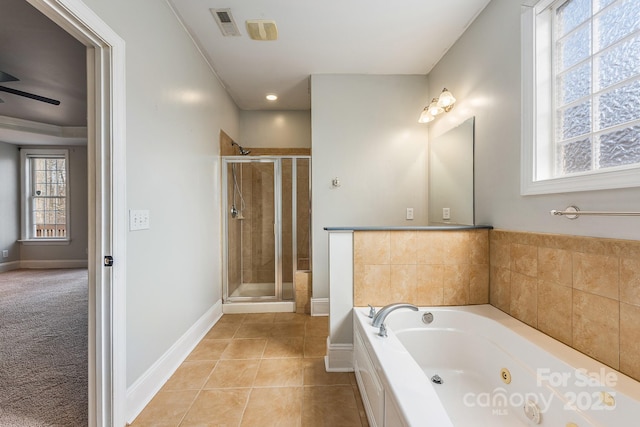 bathroom with visible vents, a stall shower, tile patterned flooring, a jetted tub, and baseboards