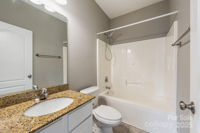 full bathroom with washtub / shower combination, vanity, and toilet