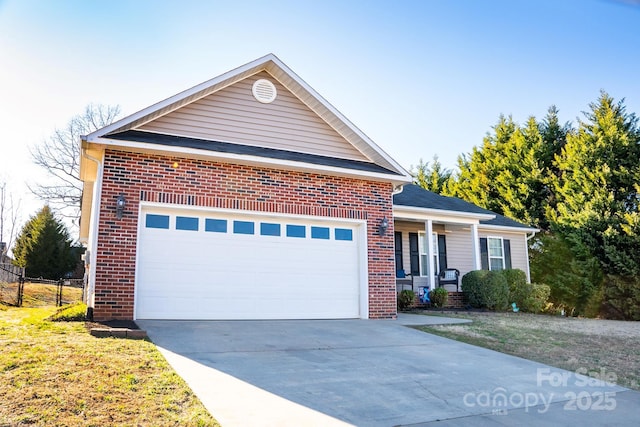 view of front of home with a porch, brick siding, driveway, and an attached garage