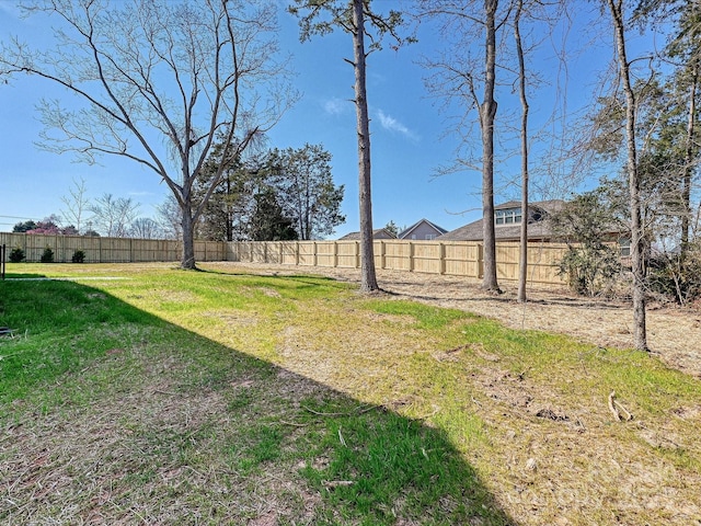 view of yard featuring a fenced backyard