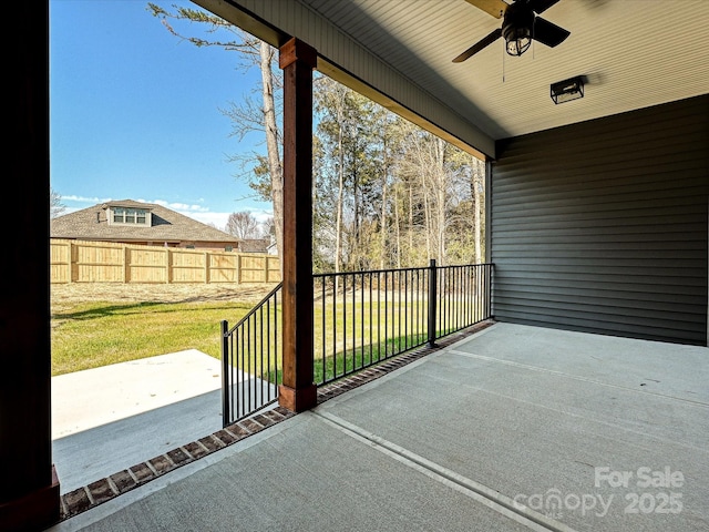 exterior space featuring a ceiling fan