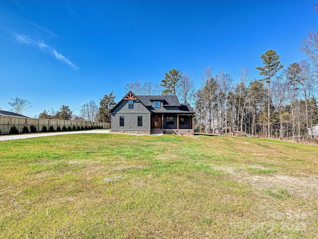 view of front of home with a front lawn