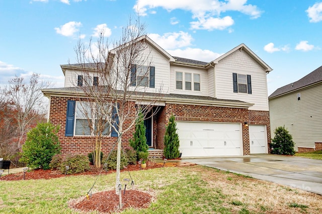 view of front of house with brick siding, driveway, a front yard, and a garage