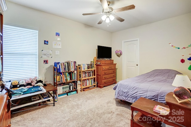 bedroom with carpet floors and a ceiling fan