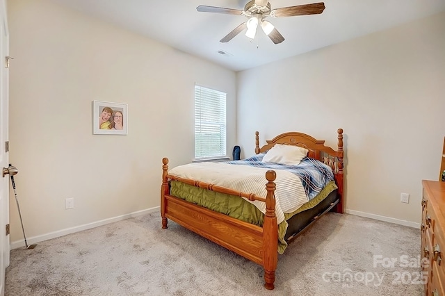 bedroom with visible vents, baseboards, carpet, and ceiling fan