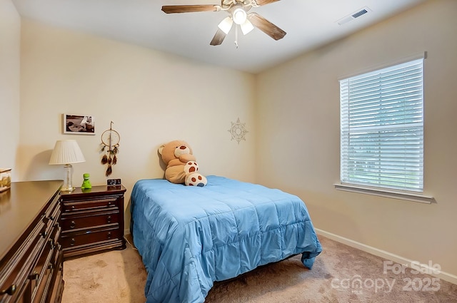 bedroom featuring a ceiling fan, carpet flooring, baseboards, and visible vents