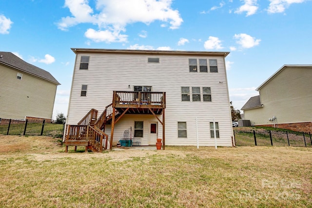 rear view of house with stairway, a yard, a fenced backyard, and a wooden deck