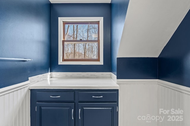 bathroom featuring a wainscoted wall