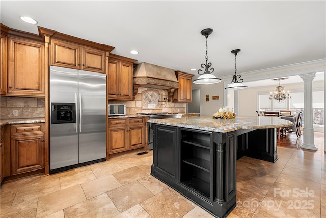 kitchen featuring a kitchen island, brown cabinets, stainless steel appliances, premium range hood, and open shelves