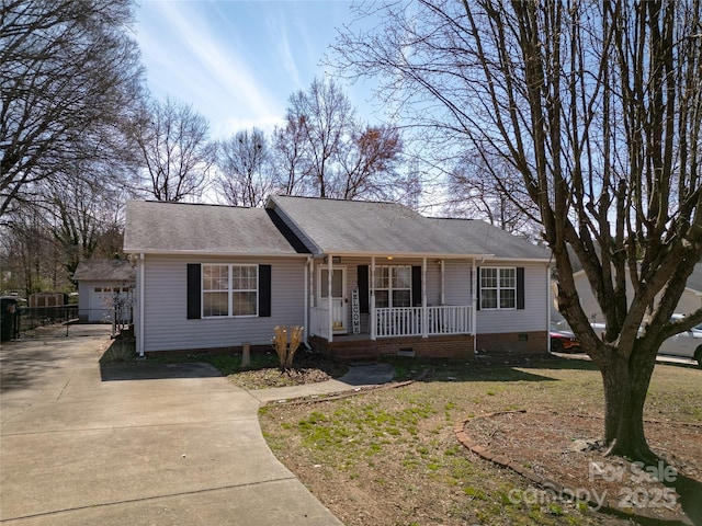 ranch-style home with a porch, crawl space, and roof with shingles