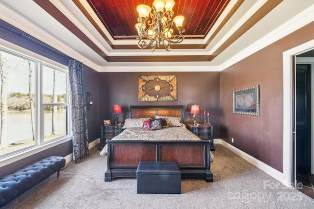 bedroom featuring an inviting chandelier, baseboards, ornamental molding, and carpet flooring