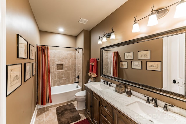 full bathroom with visible vents, a sink, toilet, and tile patterned floors