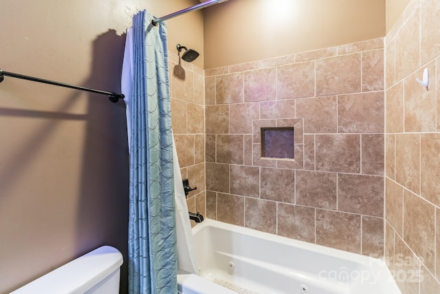 full bath with shower / bath combo and toilet