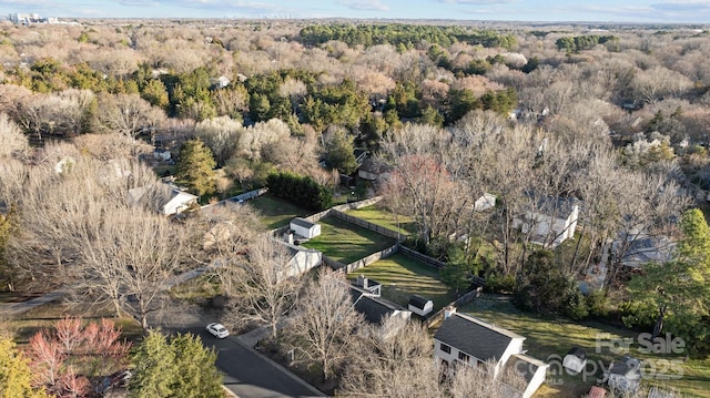 bird's eye view with a forest view